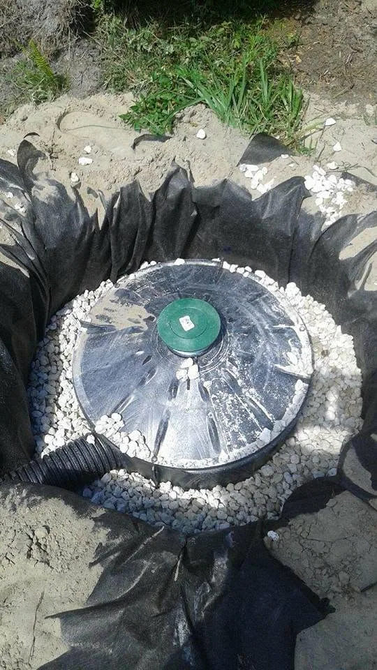 Drywell basin green cap gravel filter fabric corrugated drain pipe, Sanford
